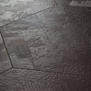 Déchirer porseleinen vloer van Mutina met betoneffect-reliëf