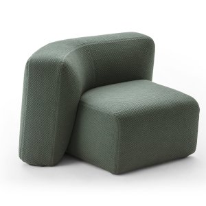 Fauteuil Suiseki naast een lage tafel in de lounge
