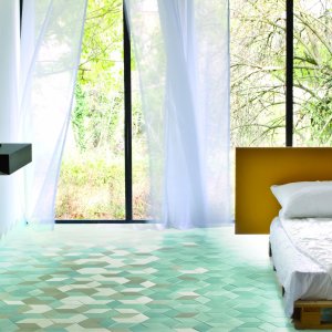 Detail van de drie garentinten in een Tex tegel in Cream